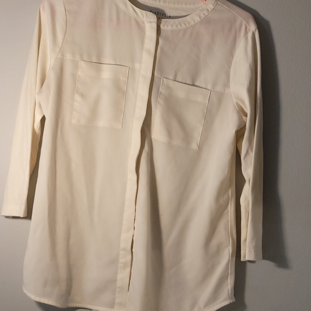 Is cream colored button-up